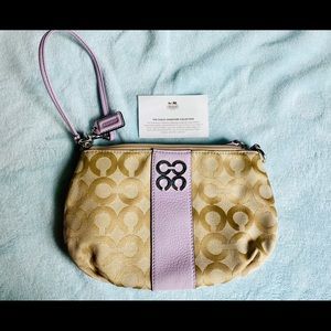 Coach wristlet with leather trim! So cute!